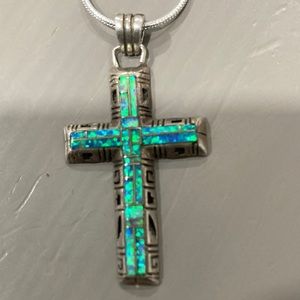Vintage opal cross pendant in sterling silver. Includes 30” chain marked .925.